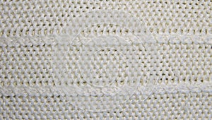 Knitted woolen texture. Knitted pattern