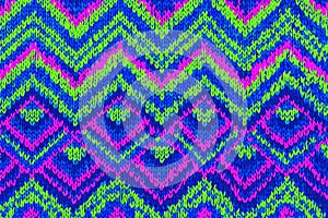 Knitted zigzag and diamond pattern in vibrant color.