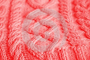 Knitting background. Craft concept. The texture of a knitted woolen fabric of a warm winter product Close-up