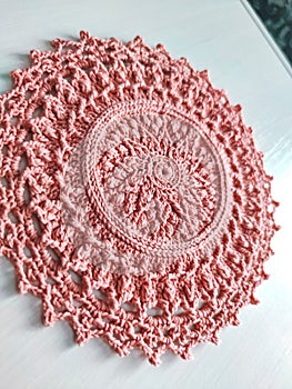 Knitting crochet doily napkin cotton pink yarn thread hook craft creative closeup macro photo
