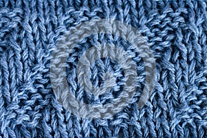 Knitting diagonal pattern of natural blue wool