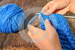 Knitting with knitting needles :