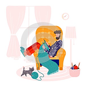 Knitting man with needles in home interior. Male relax hobby to make cozy scarf or cotton quilt for himself. Person