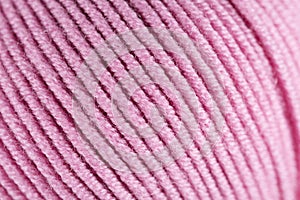 Pink wool thread ball macro closeup