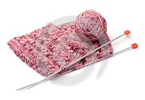 Knitting with needles and yarn ball