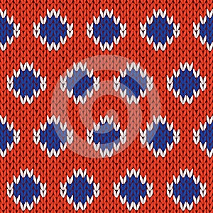 Knitting seamless pattern in blue, white and orange colors