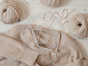 Knitting sweater project in progress. Making neck