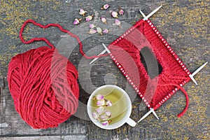 Knitting and tea with roses