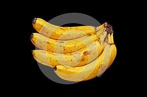 knitting of very ripe bananas on a black background