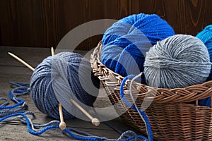 Knitting yarn, knitting needles and wicker basket