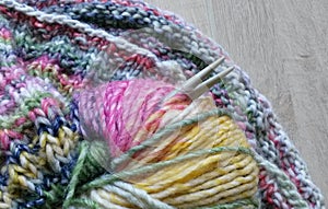 Knitting yarn and needles with multicolor wool