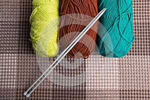 Knitting yarns and knitting needles.