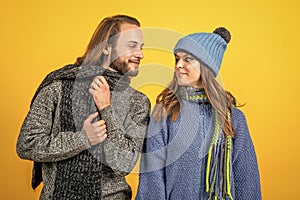 knitwear fashion for all family. cheerful couple in love. romantic relations of man and woman in winter. love can warm
