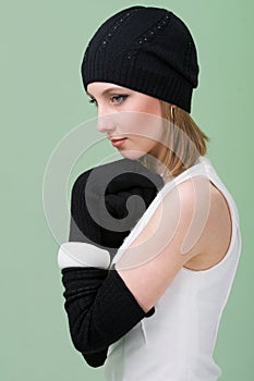 Knitwear. young woman wearing a winter cap