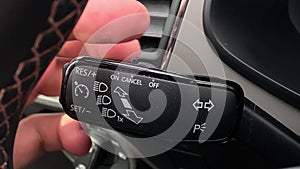 knob switch control turn signals and car light close-up