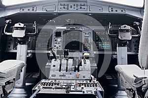 Knobs and buttons. Close up focused view of airplane cockpit