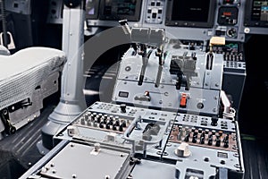 Knobs and buttons. Close up focused view of airplane cockpit