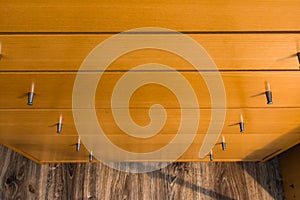 Knobs of Wooden Dresser Drawer Texture Pattern Background