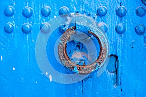 Knocker on a blue door
