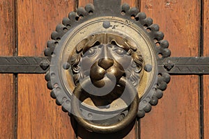 Knocker at a door of St Thomas Church (Thomaskirche) in Leipzig, Saxony, Germany.