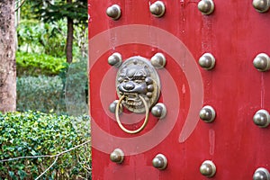 Knockers and rivets on the gate of an ancient Chinese building