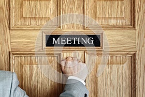 Knocking on a meeting room door