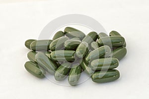 Knot of green gelatinous capsules