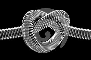 Knotted metal spring