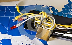 knotted net cable around a padlock over a US map