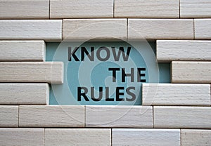 Know the rules symbol. Wooden blocks with words Know the rules. Beautiful grey green background. Business and Know the rules