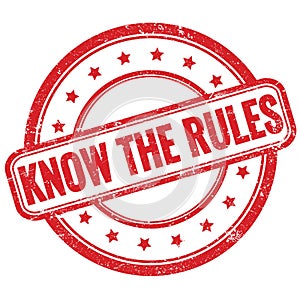 KNOW THE RULES text on red grungy round rubber stamp