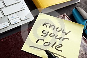 Know your role written on a memo stick.