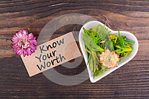 Know your worth text on card photo