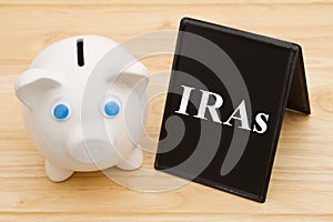 Knowing your IRA options with piggy bank photo
