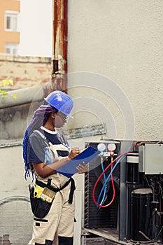 Engineer checking hvac system leaks