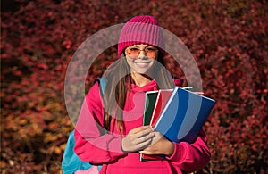 knowledge for adolescence. teen girl in autumn park outdoor. autumn is a time to study. knowledge and education. school