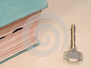 Knowledge Concept With Old Big Book And Key.