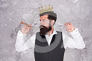 He knows formula for success. Bearded man wear crown on abstract background. Successful barber enjoy success in