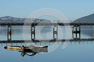 Knysna lagoon with rail bridge in front photo