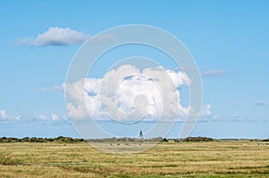 Kobbeduin beacon and marshes of Oosterkwelder on Frisian island Schiermonnikoog, Netherlands photo
