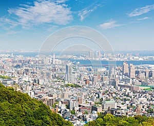 Kobe cityscape and skyline with port view from mountain.