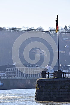 Koblenz, Germany - 02 27 2022: German flag on Deutsches Eck