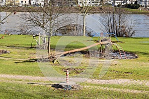 Koblenz, Germany - 02 11 2021: Leftovers from the flood on Rheinwiesen, driftwood on the playground photo