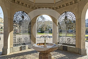 Kochbrunnen cooking well in Wiesbaden with healthy hot spring and historic fountain