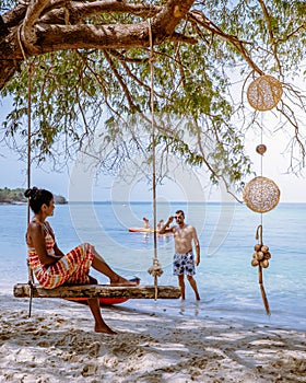 Koh Kham Trat Thailand, people relax on tropical Island Koh Kam Thailand, White beach and coast of the blue sea at Koh