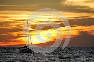 Koh kood beach thailand, sunset boat orange sky people on boat, kayaking silhouette