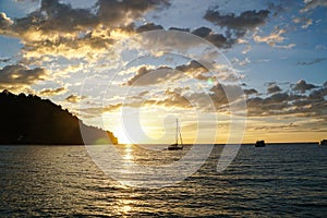 Koh kood beach thailand, sunset boat orange sky people on boat, kayaking silhouette