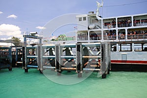 KOH PHANGAN, THAILAND - AUGUST 20, 2013: Ferry boat conveying passengers to Phangan island port.