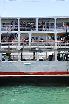 KOH PHANGAN, THAILAND - AUGUST 20, 2013: Ferry boat conveying passengers to Phangan island port.