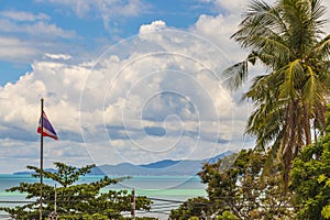 Koh Samui island beach and landscape panorama with Thailand flag